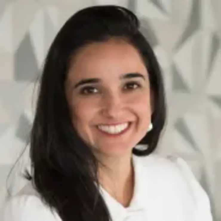 Dr. Shérida Mansur